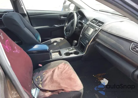 2015 Toyota Camry Le z USA, uszkodzony, nr VIN 4T4BF1FK9FR477051